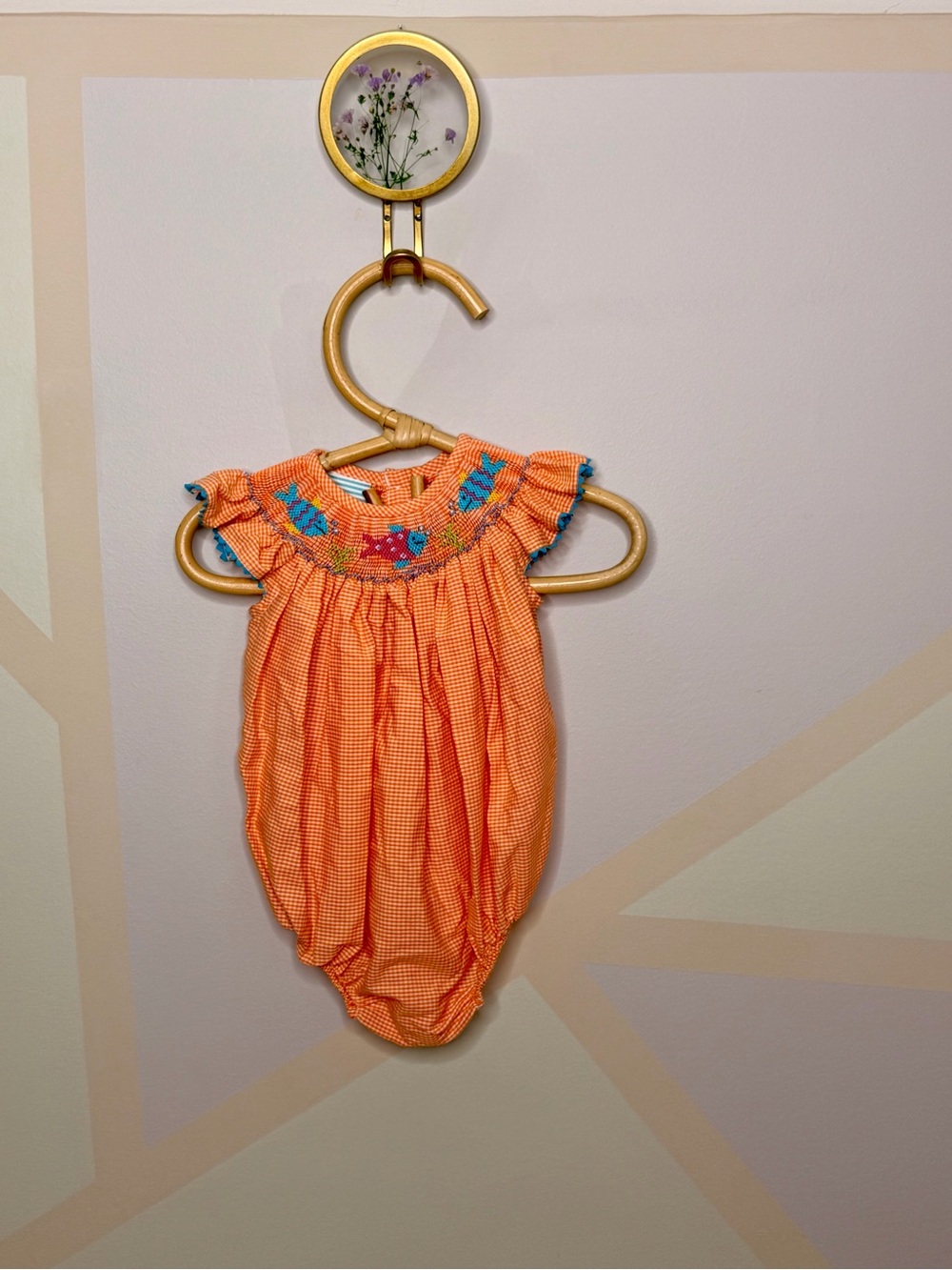 Orange Smocked Girls' One-Piece Romper